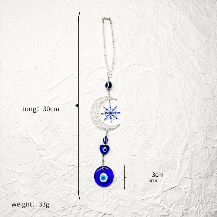 Porte-clés Olivenorma à thème céleste contre le mauvais œil avec lune, soleil et cœur - image 7