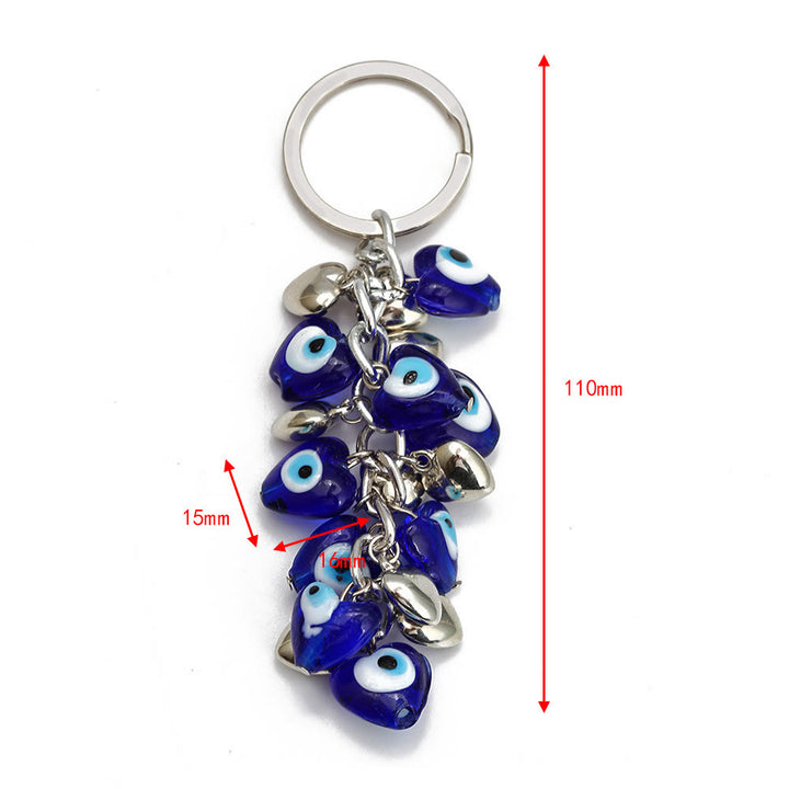 Porte-clés Olivenorma en forme de cœur bleu vibrant avec plusieurs breloques - image 12