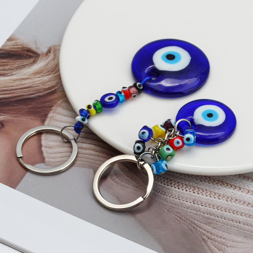 Porte-clés Olivenorma en forme de cœur bleu vibrant avec plusieurs breloques - image 13