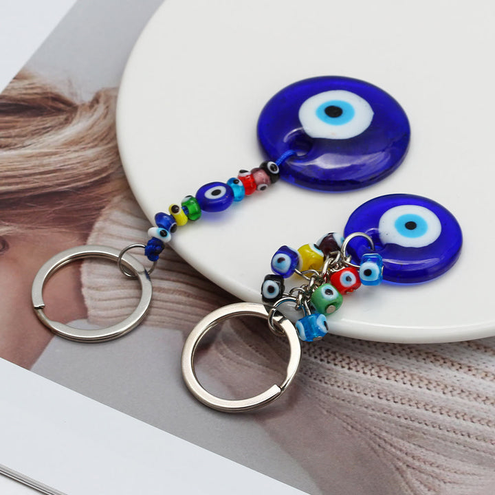 Porte-clés Olivenorma en forme de cœur bleu vibrant avec plusieurs breloques - image 13