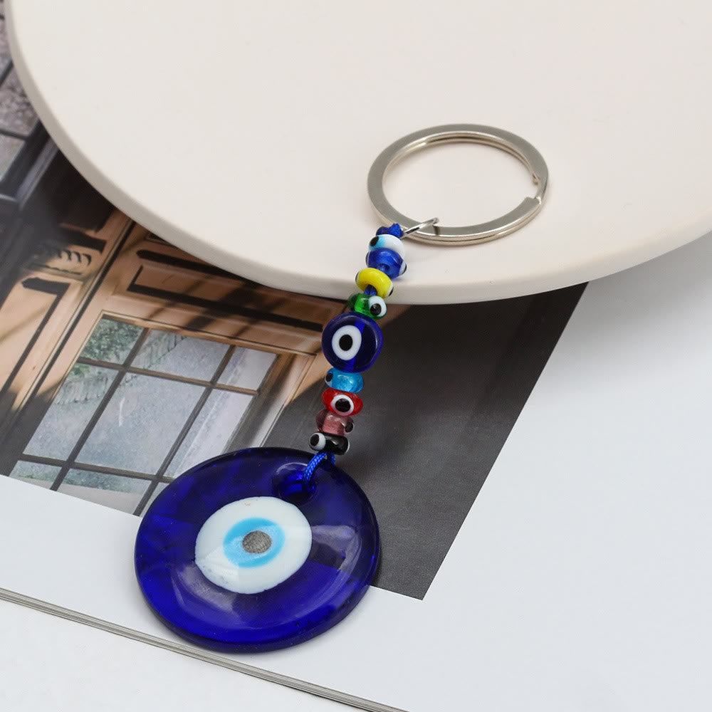 Porte-clés Olivenorma en forme de cœur bleu vibrant avec plusieurs breloques - image 2