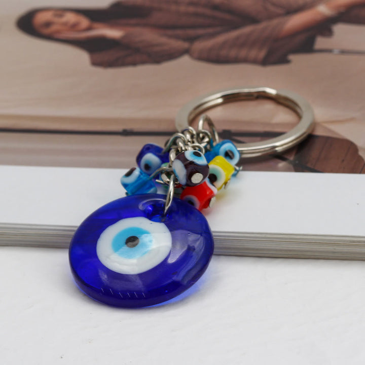 Porte-clés Olivenorma en forme de cœur bleu vibrant avec plusieurs breloques - image 6