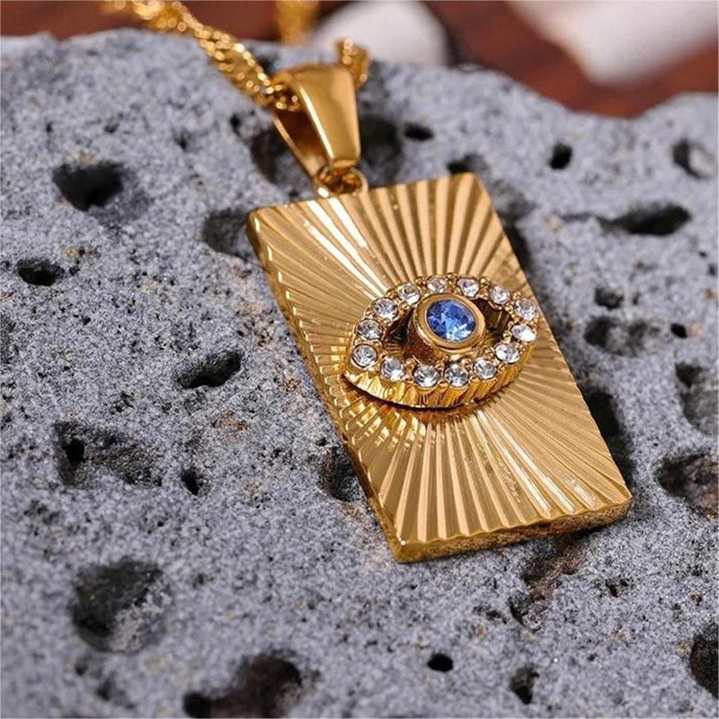 Collier Olivenorma avec topaze bleue et zircon blanc mauvais œil