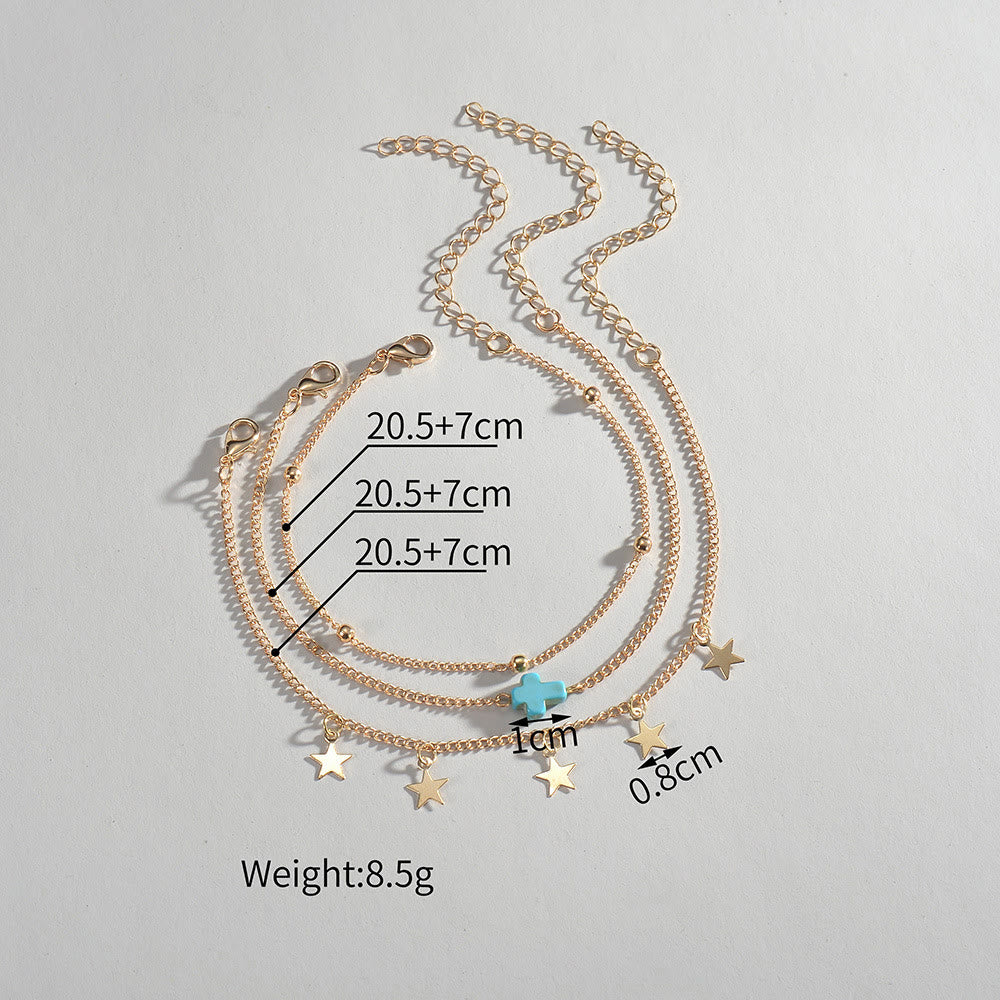 Bracelet de cheville multicouches pour femme avec pompon croisé et étoile de plage Olivenorma