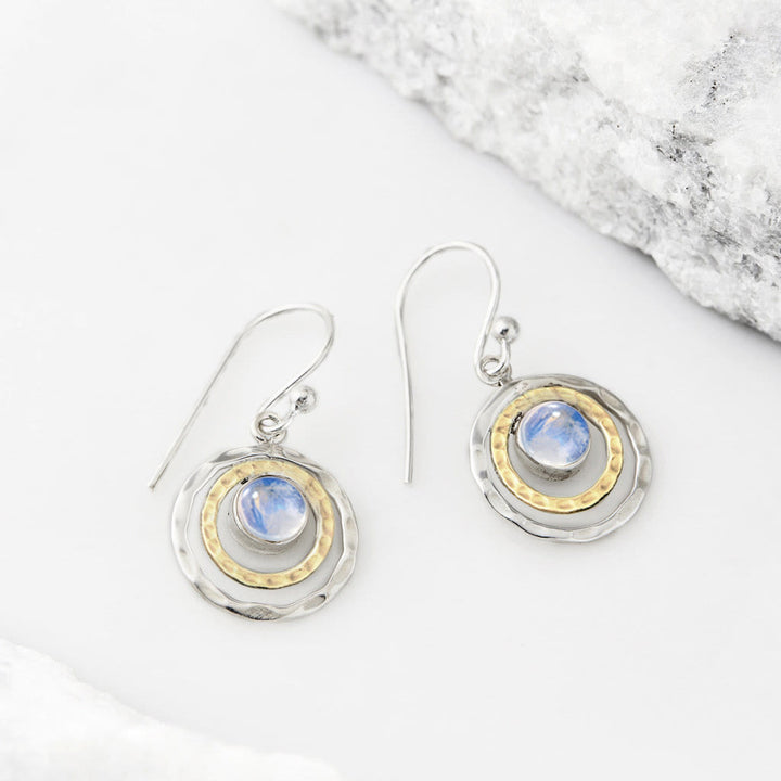Boucles d'oreilles à découpe circulaire avec pierres précieuses