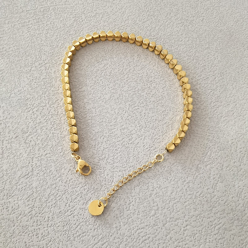 Ensemble de quatre bracelets en perles de cristal naturel Olivenorma