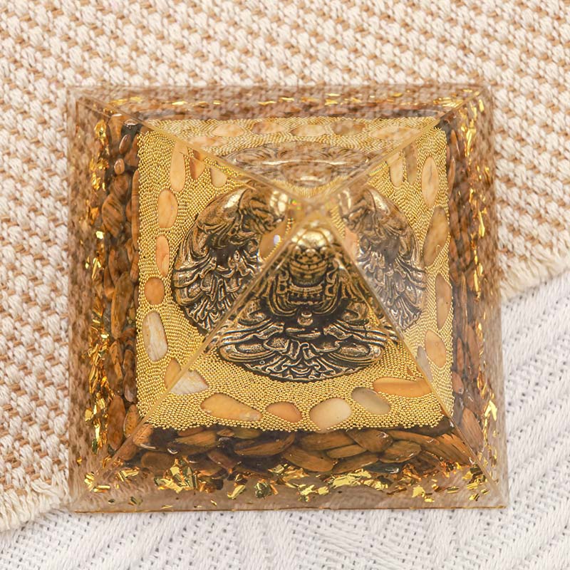 Pyramide d'orgone de Bouddha Olivenorma avec protection en œil de tigre