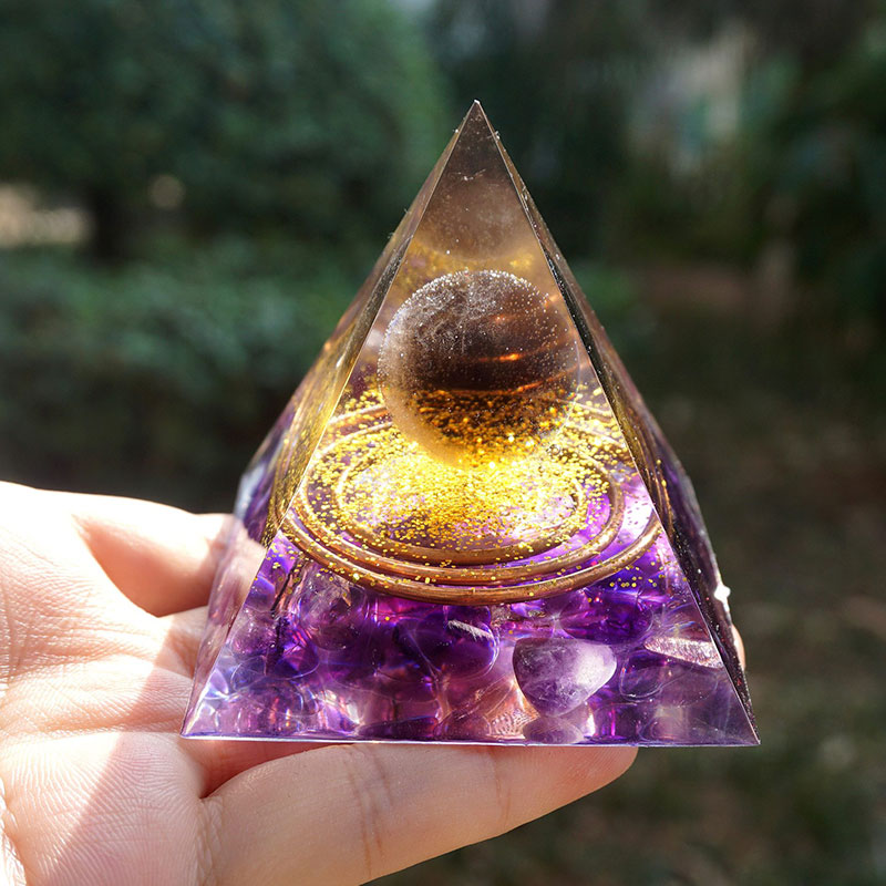 Boule de quartz fumé Olivenorma avec pyramide d'orgone en améthyste