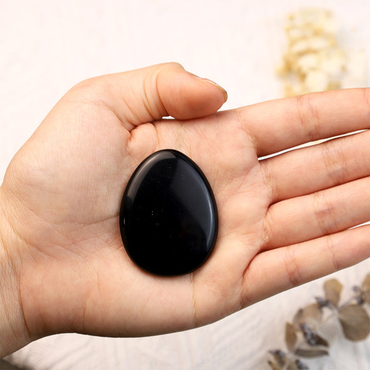 Pierre d'inquiétude pour le pouce en forme d'œuf d'onyx noir Olivenorma