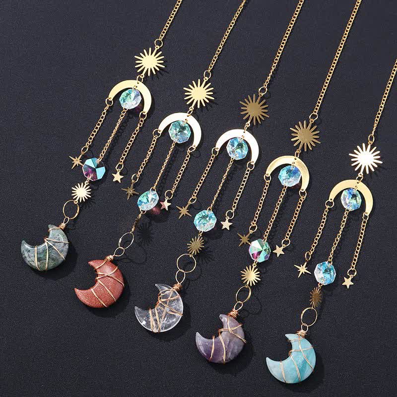 Ornement en cristal fait main avec pierres précieuses en forme de soleil et de lune