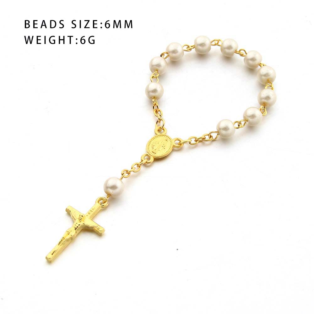 Bracelet en perles et croix en forme de cœur Olivenorma