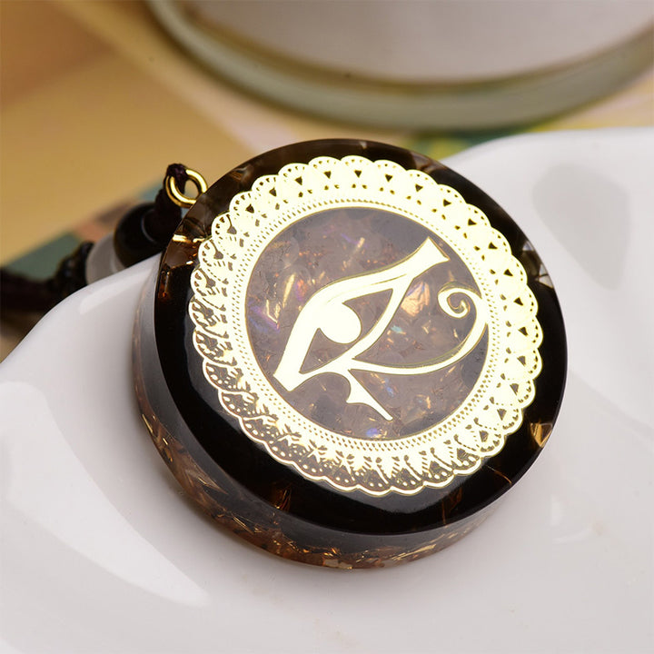 Collier symbole œil d'Horus en obsidienne et agate rouge Olivenorma