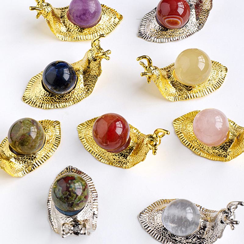 Support de boule de cristal naturel Olivenorma, petite décoration en pierre précieuse en forme d'escargot