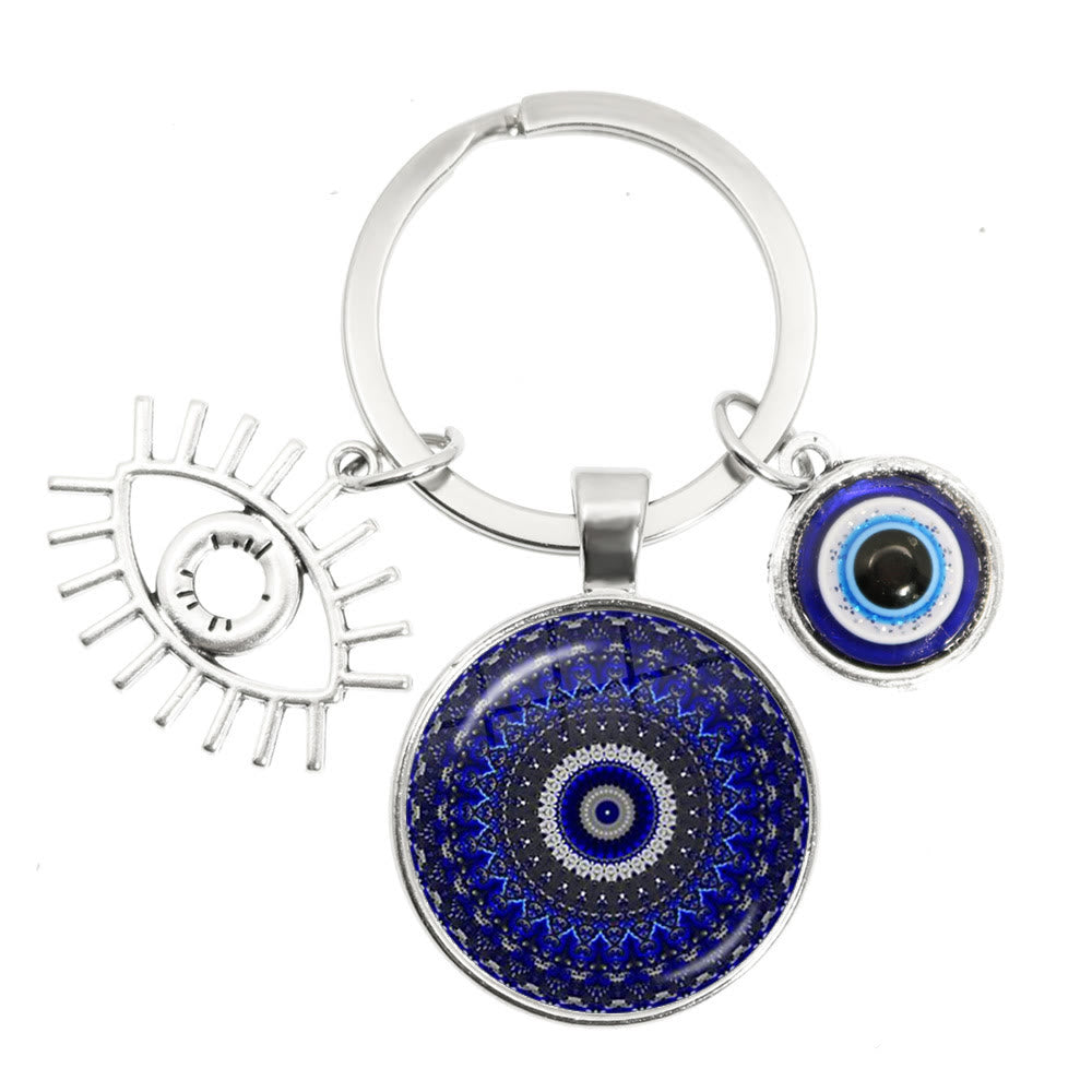 Porte-clés en époxy bleu mauvais œil Hamsa Olivenorma