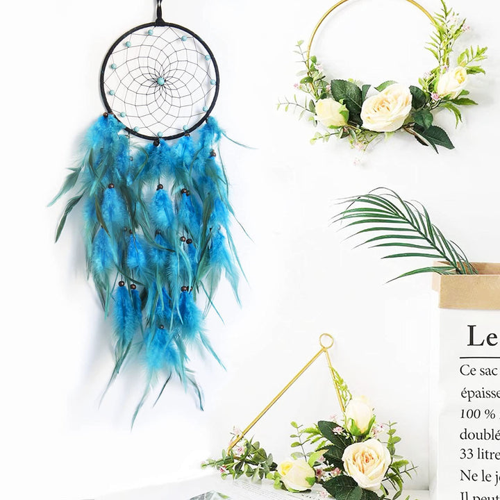 Attrape-rêves à plumes bleues et florales tressées en perles turquoise Olivenorma