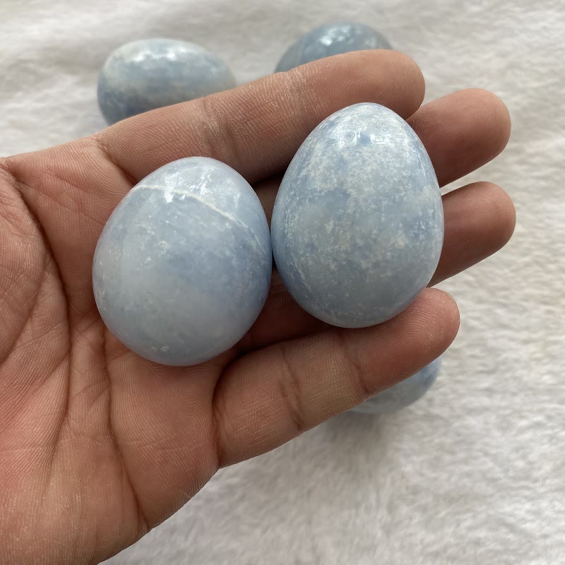 Œuf en cristal bleu aigue-marine poli Olivenorma en forme d'œuf