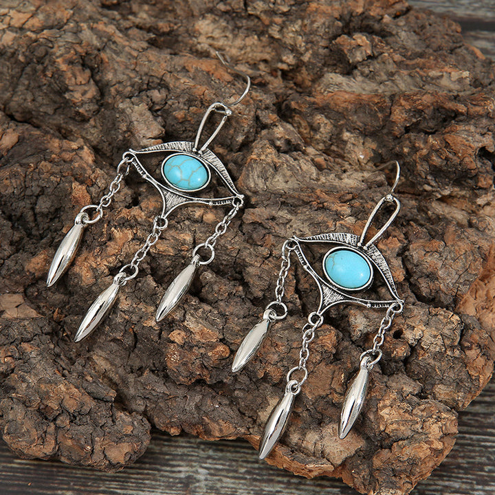 Boucles d'oreilles bohèmes en turquoise avec découpes géométriques Olivenorma