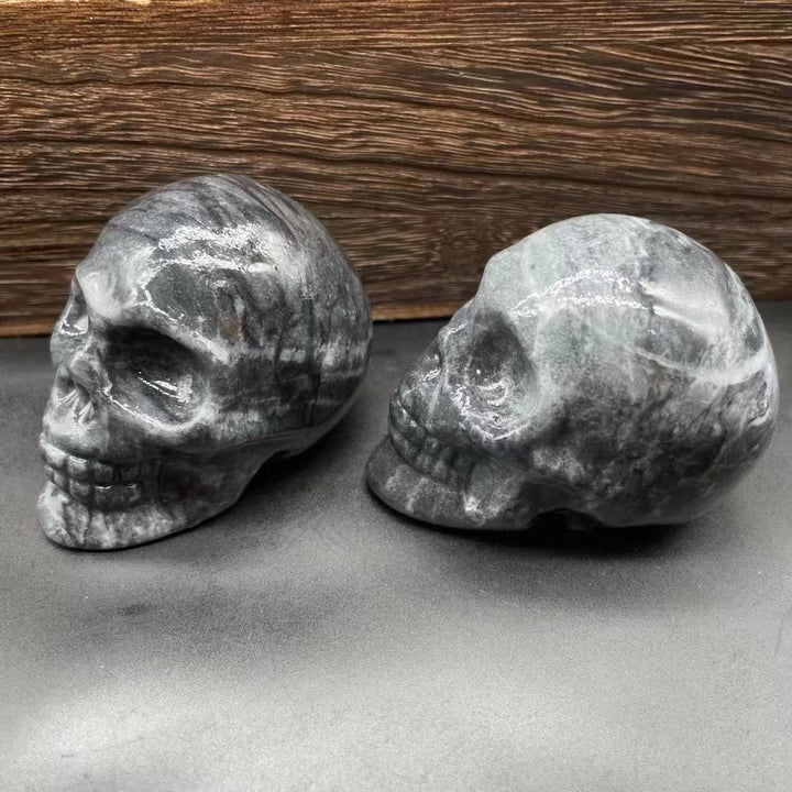 Décoration en pierre précieuse de crâne en cristal naturel sculpté Olivenorma de 7 cm