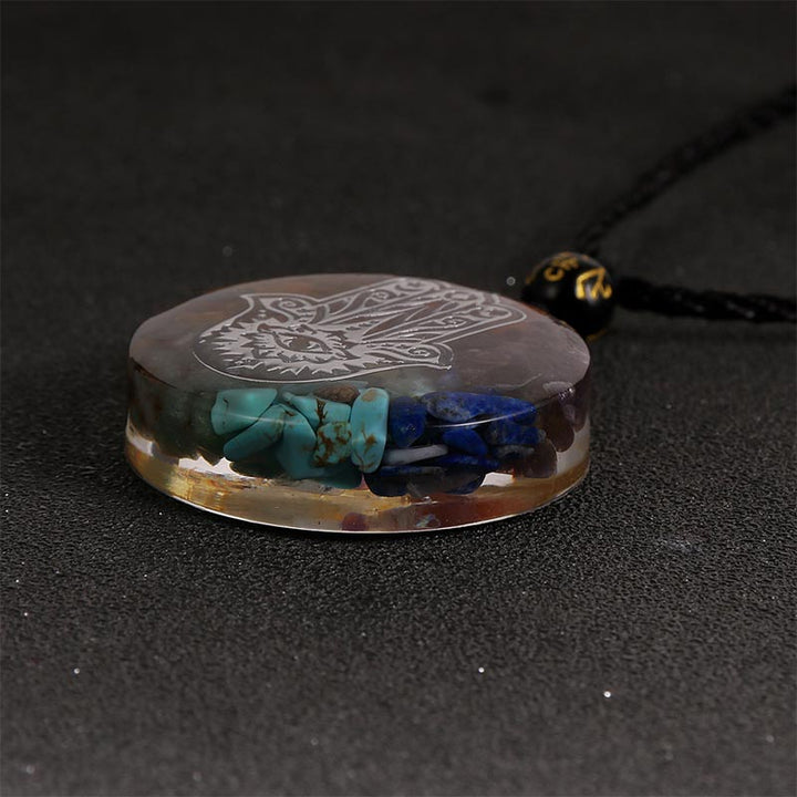 Collier symbole du mauvais œil en pierre de cristal naturel des chakras Olivenorma