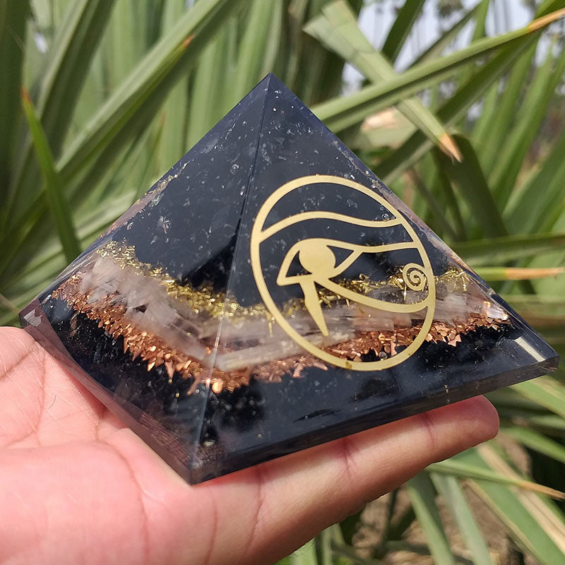Pyramide d'orgone de protection en obsidienne Olivenorma Oeil d'Horus