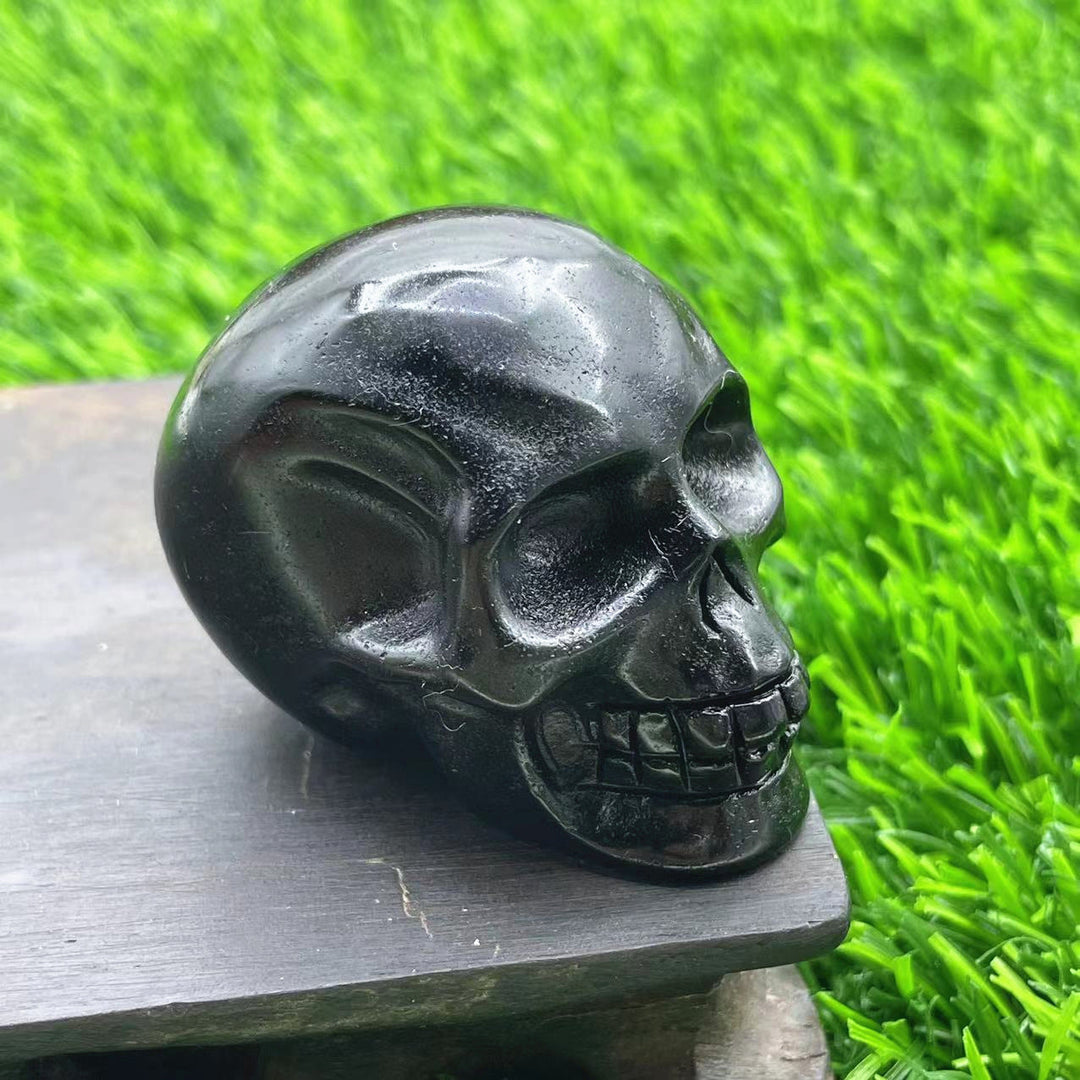 Décoration en pierre précieuse de crâne en cristal naturel sculpté Olivenorma de 5 cm