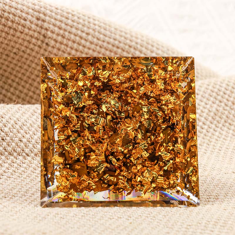 Pyramide d'orgone de Bouddha Olivenorma avec protection en œil de tigre