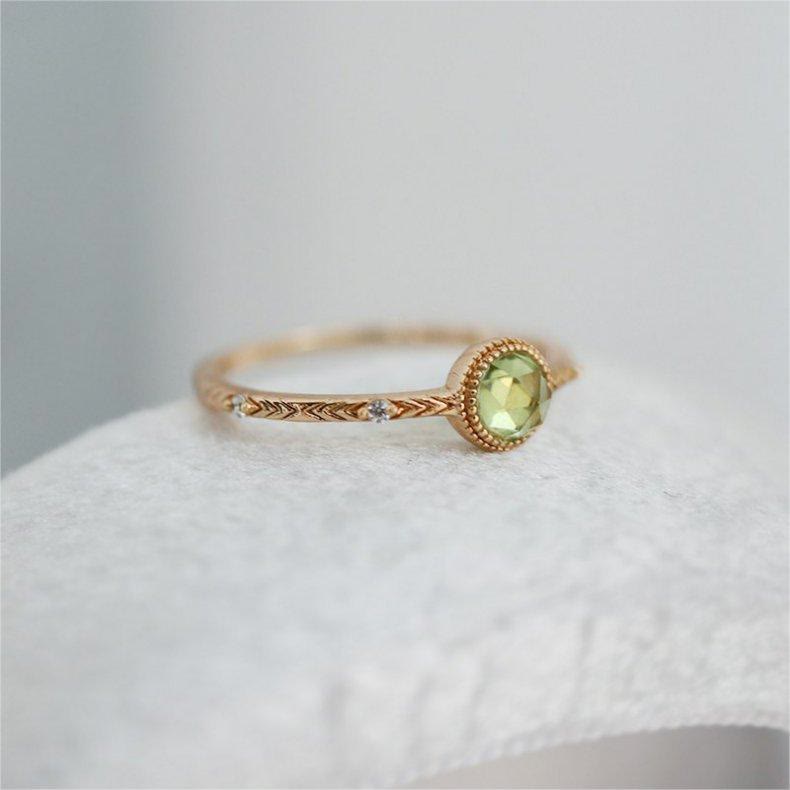 Bague en péridot vert naturel taille ronde Olivenorma