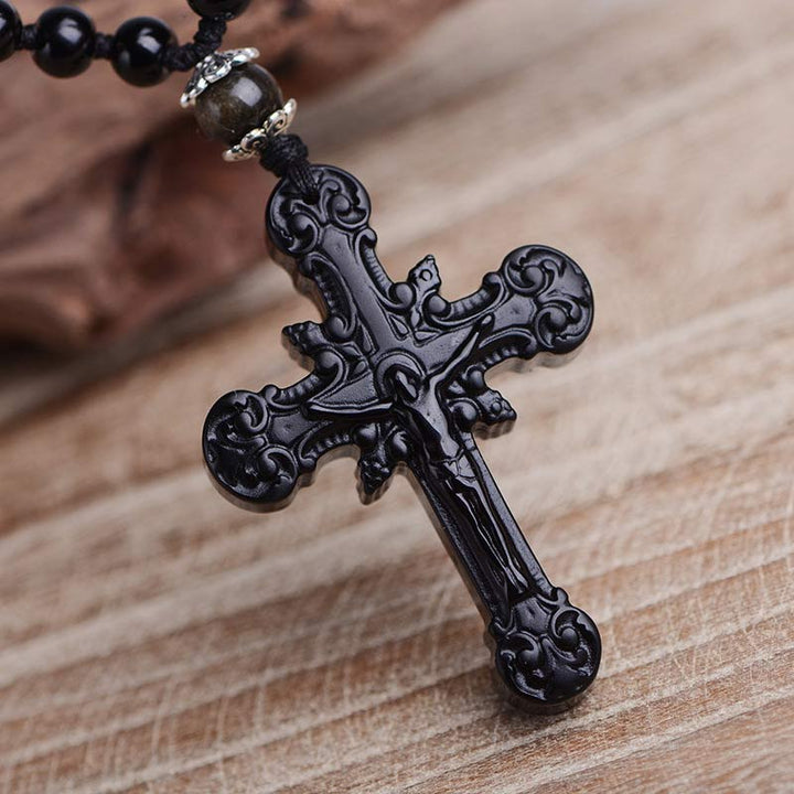 Collier symbole de croix en obsidienne Olivenorma