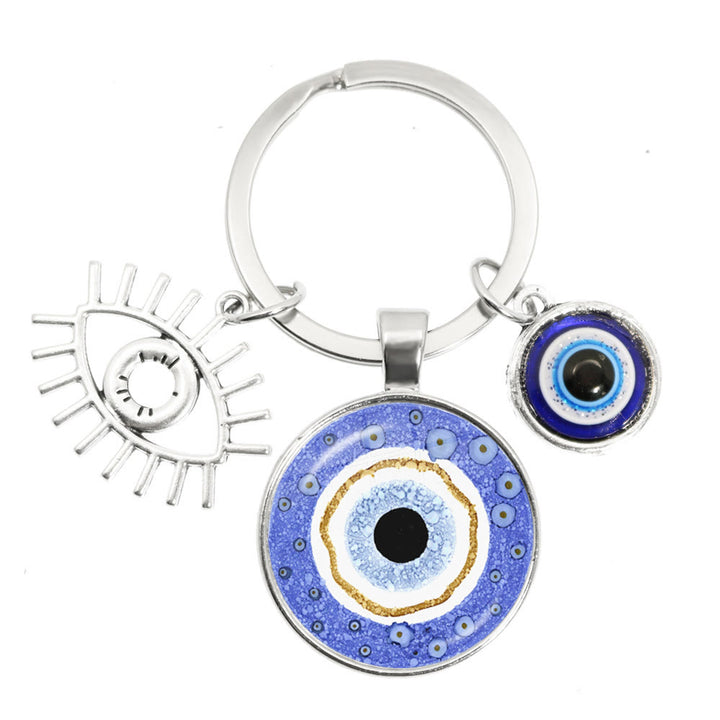 Porte-clés en époxy bleu mauvais œil Hamsa Olivenorma