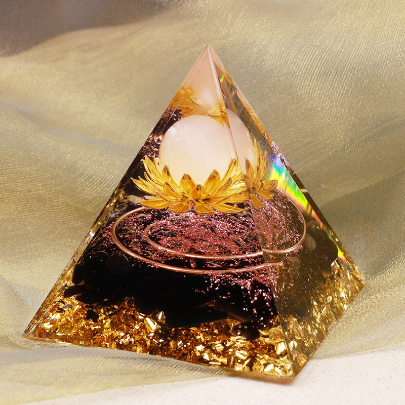 Pyramide d'orgone en cristal transparent d'obsidienne Olivenorma, symbole du lotus