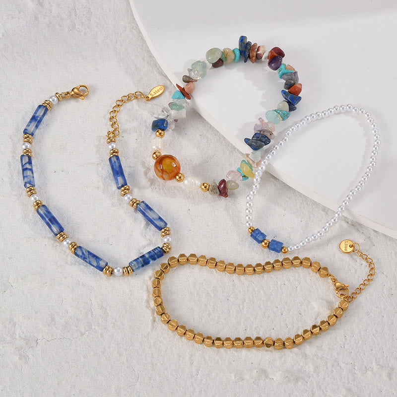 Ensemble de quatre bracelets en perles de cristal naturel Olivenorma