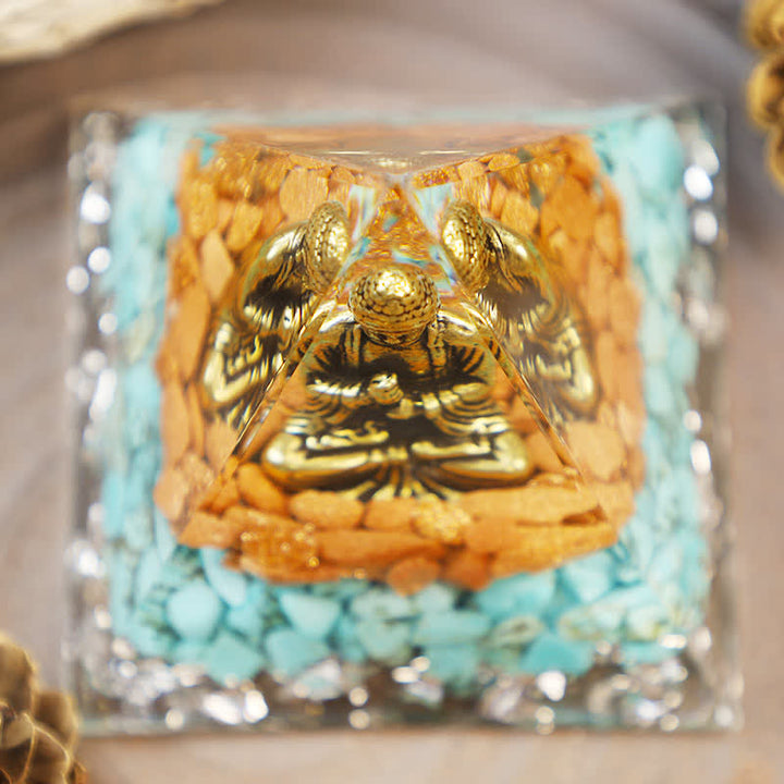 Pyramide d'orgone en grès Olivenorma avec Bouddha turquoise