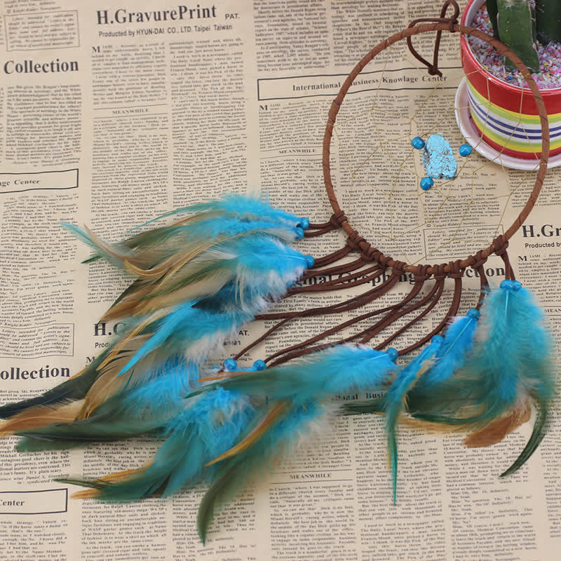 Olivenorma « Dream Knight » – Attrape-rêves en plumes turquoise