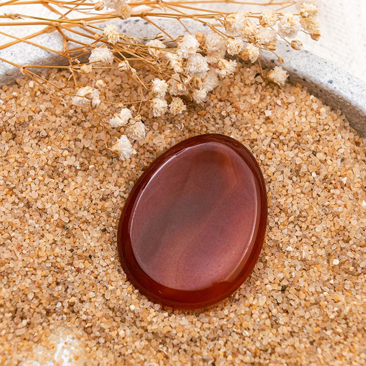 Pierre d'inquiétude pour le pouce en agate rouge Olivenorma