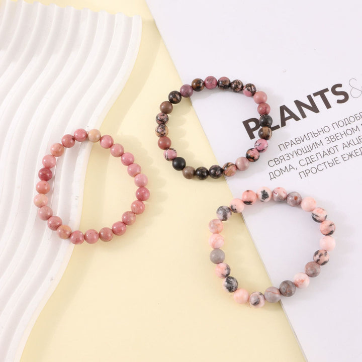 Bracelet de perles fait main en pierre zébrée rose rhodochrosite Olivenorma de 8 mm