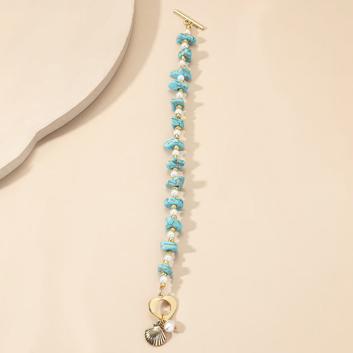 Bracelet pendentif en coquillage turquoise irrégulier Olivenorma