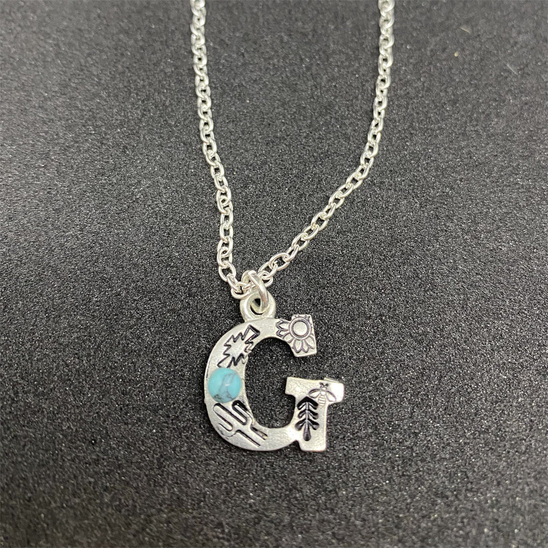 Collier avec initiale gravée en turquoise naturelle Olivenorma