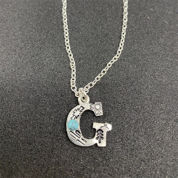 Collier avec initiale gravée en turquoise naturelle Olivenorma