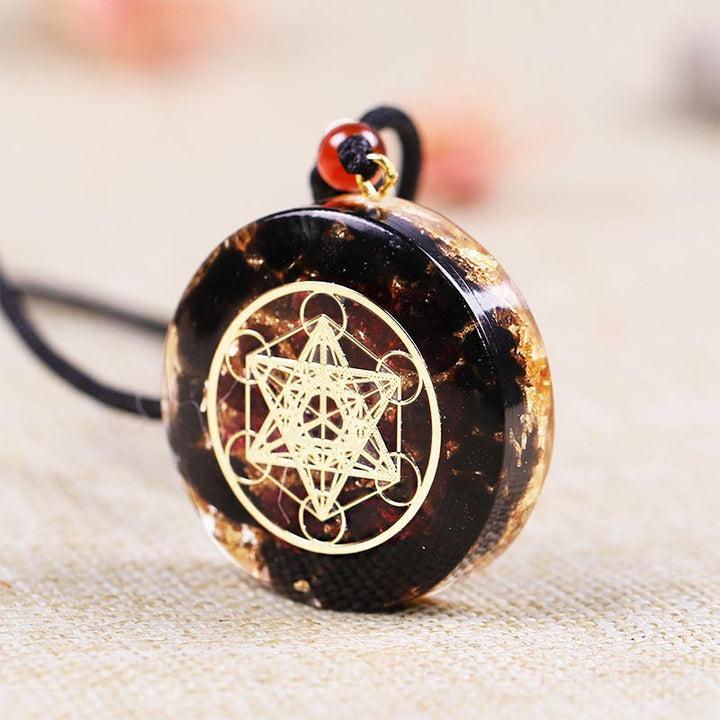 Collier symbole du cube de Métatron en obsidienne et grenat Olivenorma