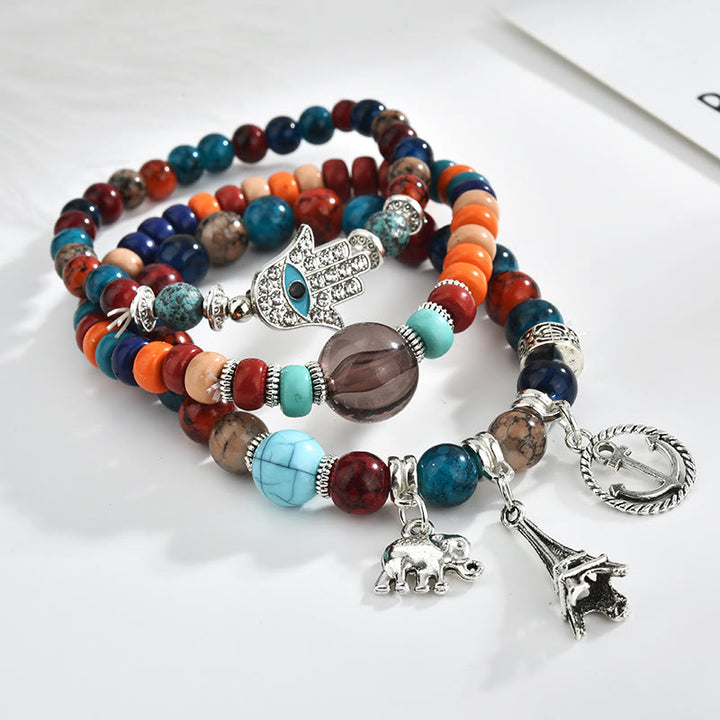 Ensemble de bracelets Hamsa contre le mauvais œil avec la tour de l'éléphant Olivenorma