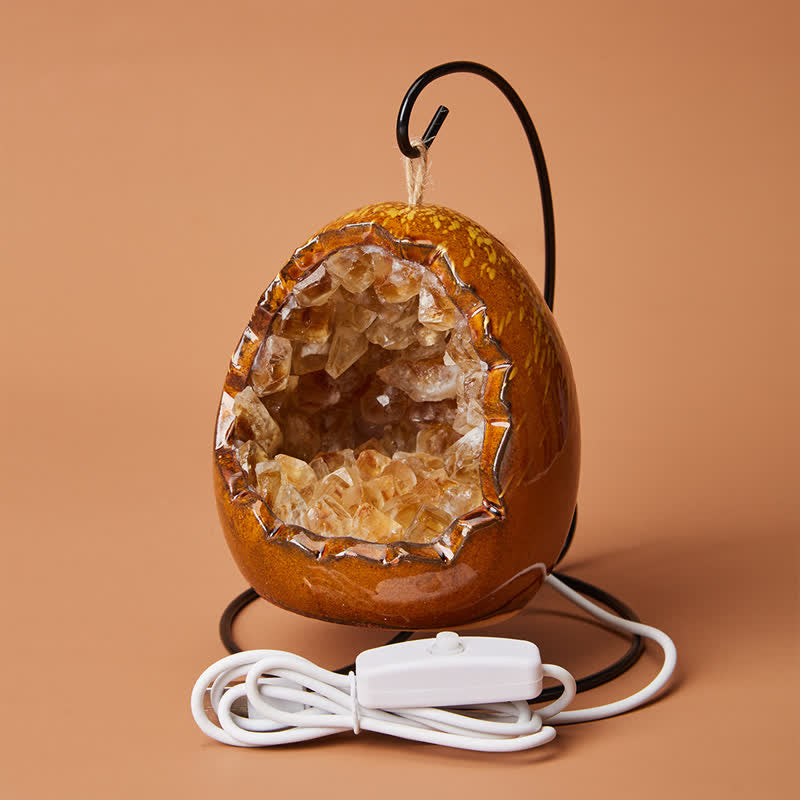 Décoration de grotte en cristal avec pierre précieuse en forme d'œuf de dinosaure Olivenorma