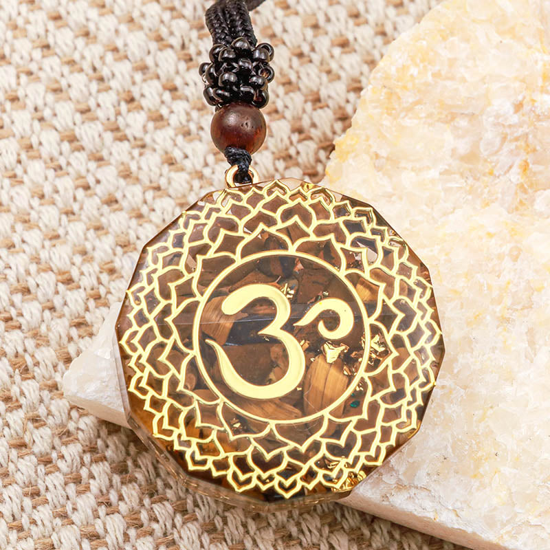 Collier de protection symbole OM œil de tigre Olivenorma