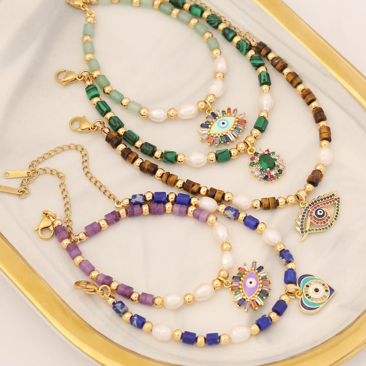 Bracelet pendentif mauvais œil en perles de cristal naturel Olivenorma