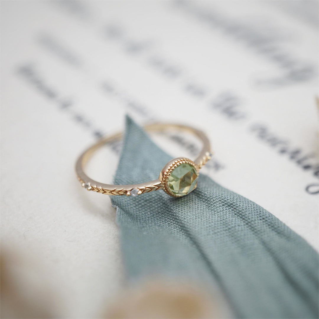 Bague en péridot vert naturel taille ronde Olivenorma