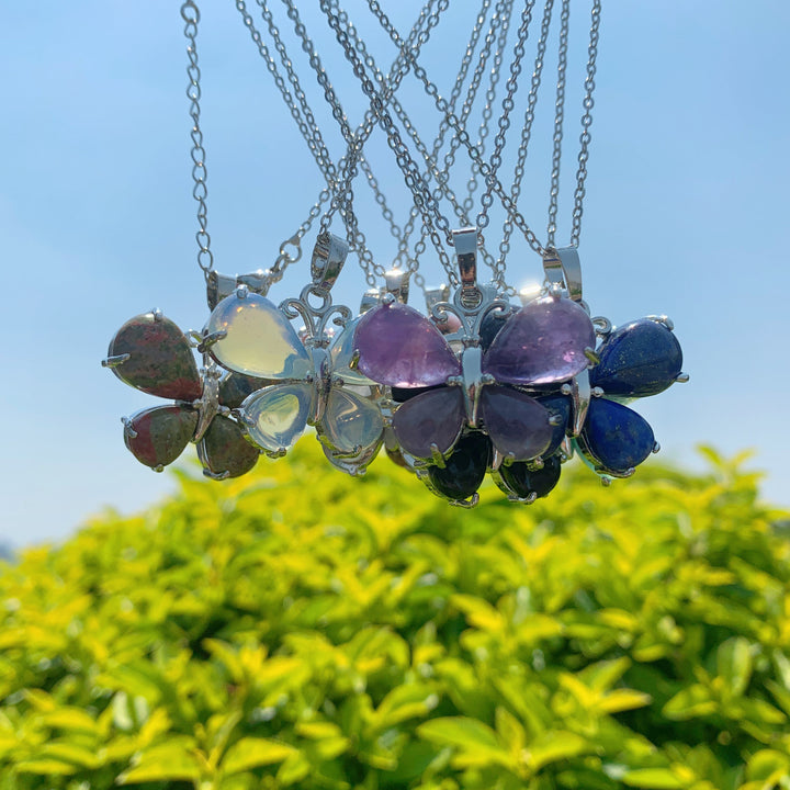 Collier papillon en cristal naturel Olivenorma