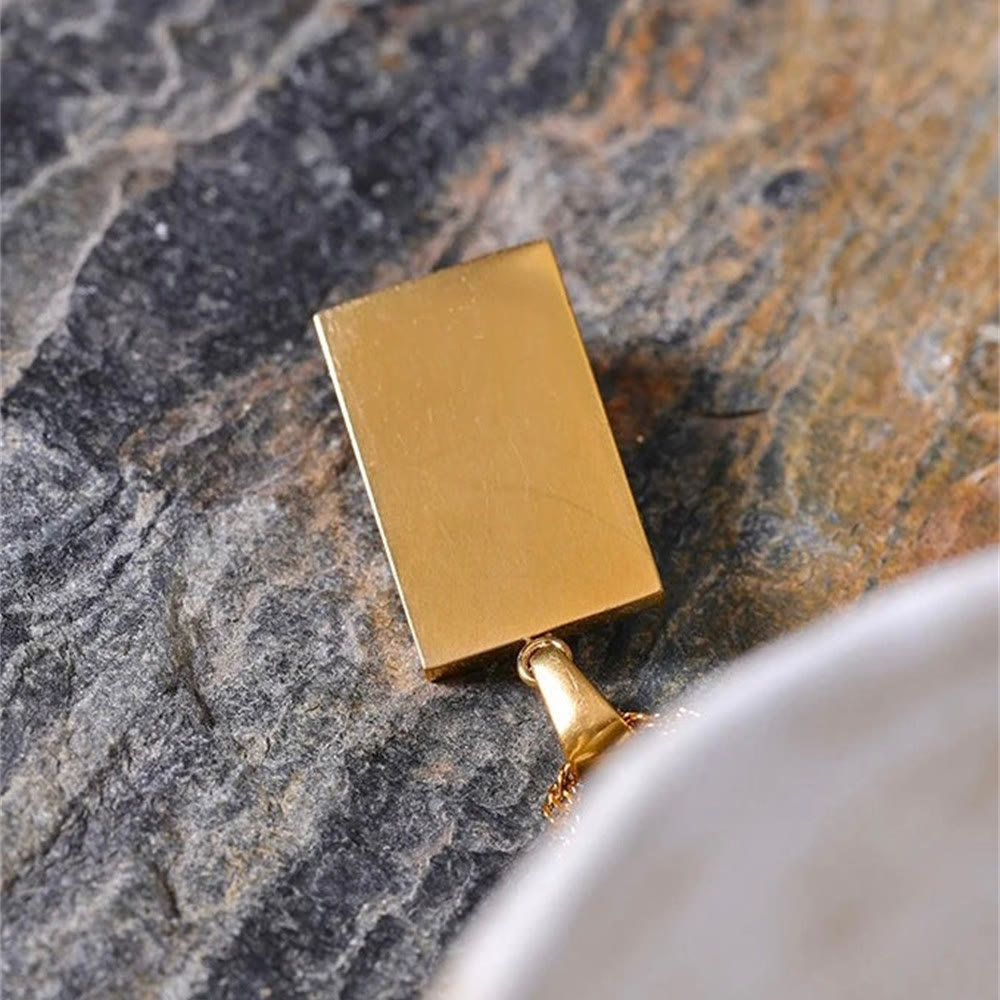 Collier Olivenorma avec topaze bleue et zircon blanc mauvais œil