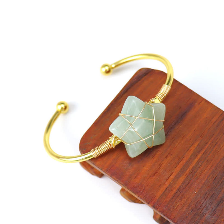 Bracelet en pierres précieuses en forme d'étoile enveloppé de fil d'or Olivenorma
