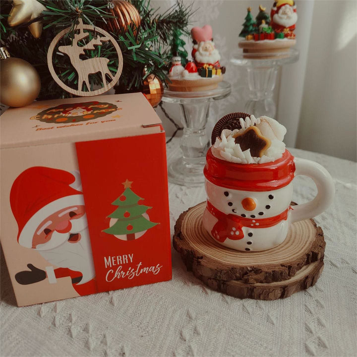 Bougie de Noël en forme de tasse de Père Noël, bonhomme de neige et élan Olivenorma