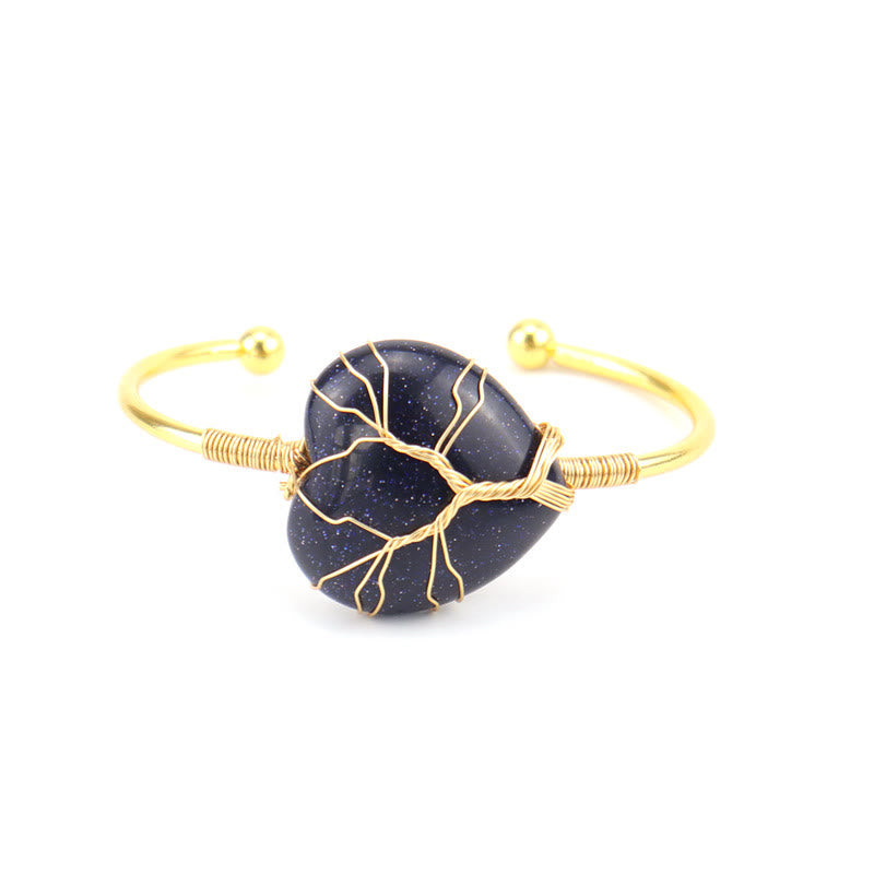 Bracelet en cristal naturel en forme de cœur enveloppé de fil de cuivre doré Olivenorma