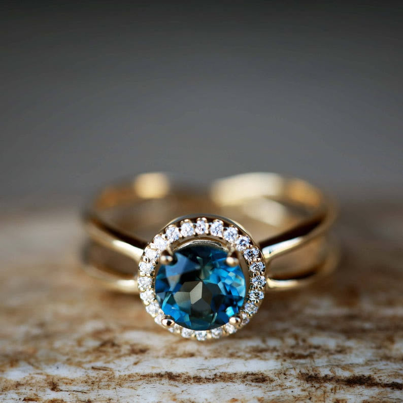 Bague de fiançailles Olivenorma « Deepen Love » avec topaze bleue taille ronde